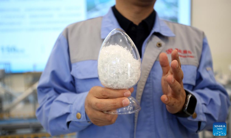 Plastic bottle fragments for making recycled polyester filaments are pictured at Ruibang Technology Co., Ltd. in Siyang County of Suqian, east China's Jiangsu Province, March 26, 2026. 