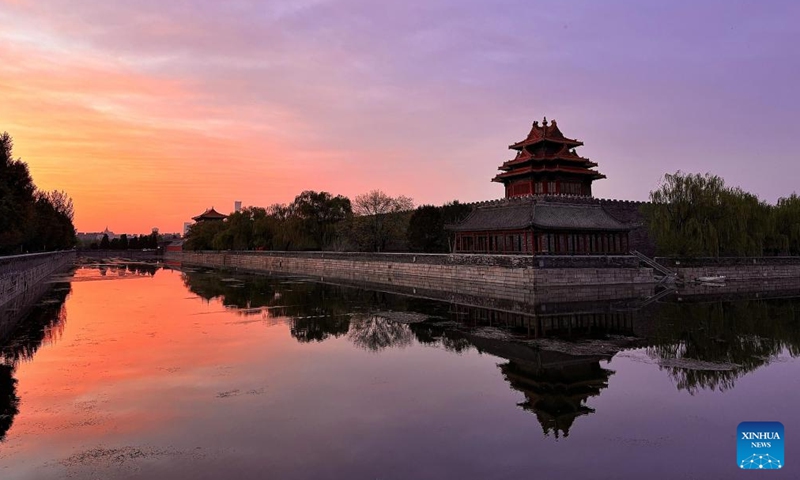 This photo taken on April 21, 2026 shows a view of the morning glow over Beijing, capital of China. (Photo by Wen Hongzheng/Xinhua)

