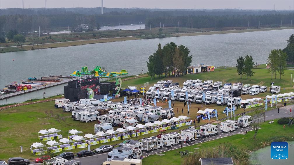 This photo taken on Oct. 16, 2025 shows a scene of Yangtze River Delta Self-Driving Tourism Industry Development Conference held at Zhuhai sports town in Wangguanji Town of Suqian, east China's Jiangsu Province. 