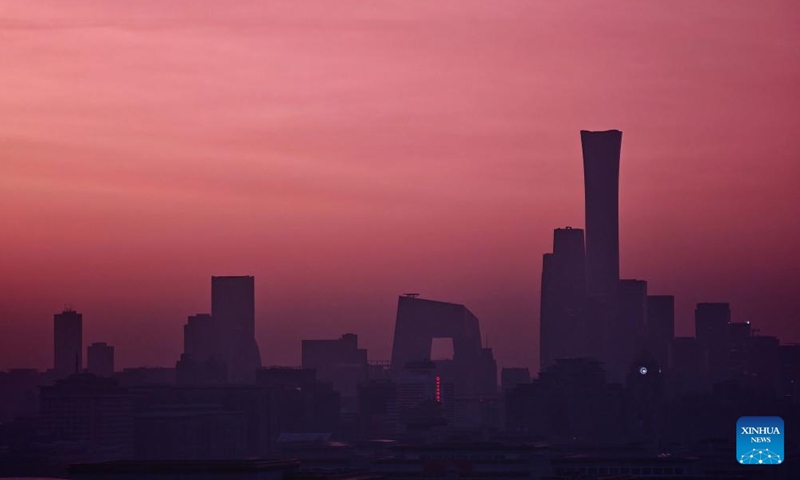 This photo taken on April 21, 2026 shows a view of the morning glow over Beijing, capital of China. (Xinhua/Xing Guangli)

