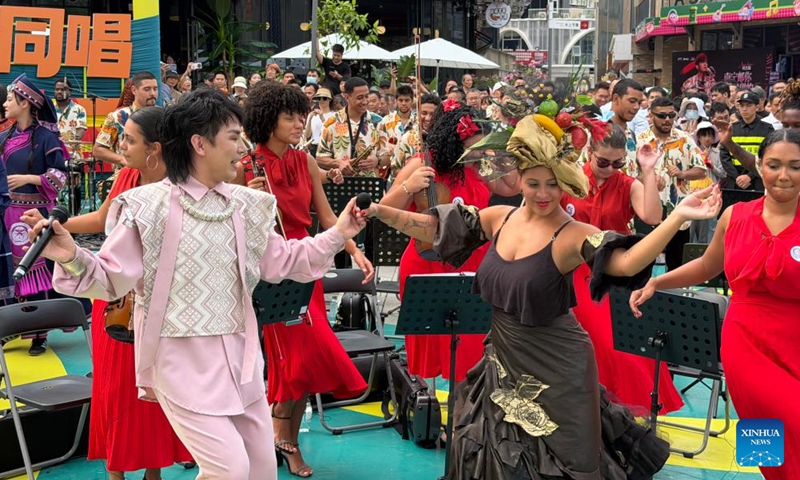Members of the Copacabana Fort Orchestra dance to music during a performance in Nanning, south China's Guangxi Zhuang Autonomous Region, April 17, 2026.(Xinhua/Zhao Huan)

