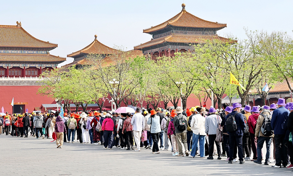 Visitors queue to enter the Palace Museum in Beijing, on April 22, 2026. Photo: VCG