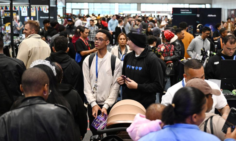 People attend Comic Con Cape Town 2026 at the Cape Town International Convention Centre in Cape Town, South Africa, May 2, 2026. The 2026 edition of Comic Con Cape Town, a major pop culture and gaming event in Africa, took place here from April 30 to May 3. (Photo by Xabiso Mkhabela/Xinhua)