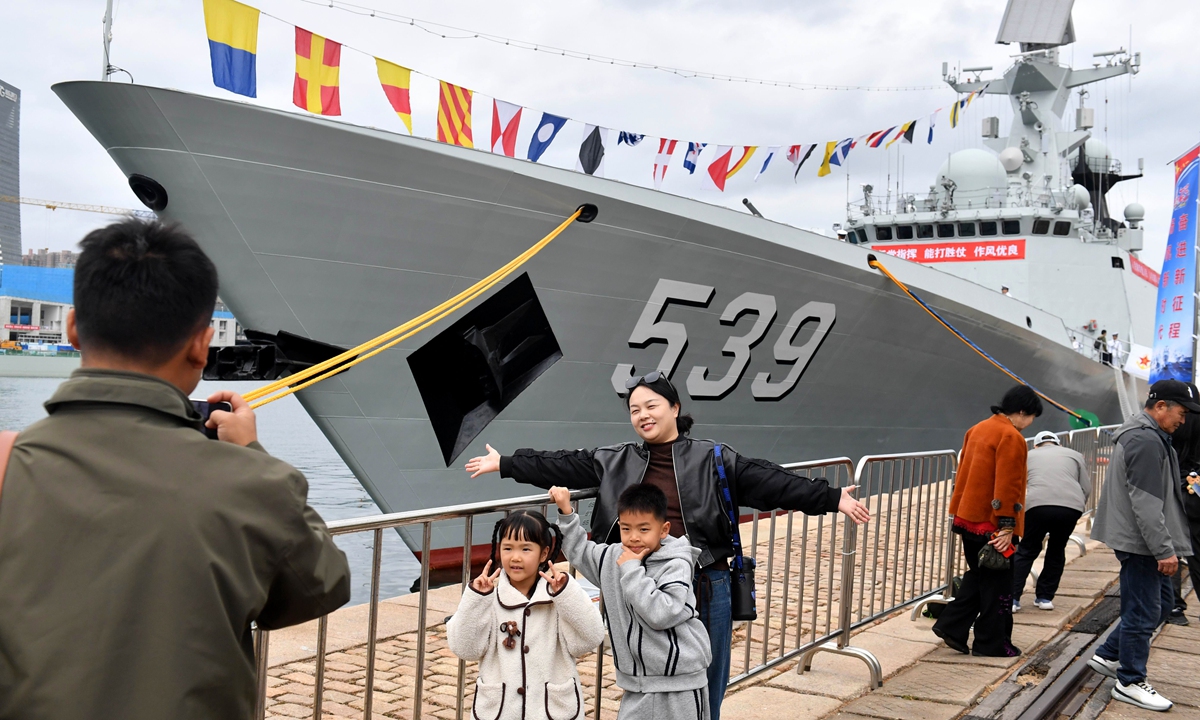 Visitors attend the ship open-day event of the Northern Theater Command Navy in Qingdao, East China's Shandong Province, on April 22, to celebrate the 77th anniversary of the founding of the PLA Navy. Photo: VCG