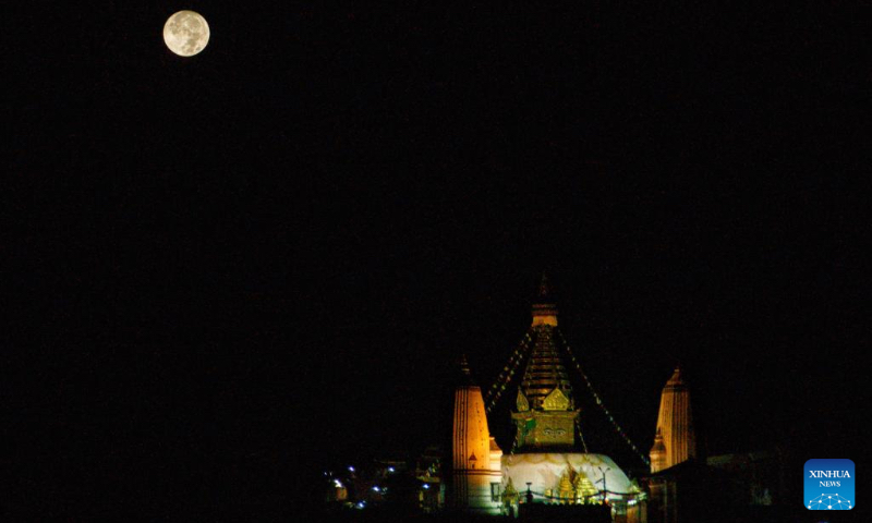 This double exposure photo taken on May 1, 2026 shows a view of Swayambhunath Stupa during Buddha Jayanti festival in Kathmandu, Nepal. Buddha Jayanti is a sacred festival commemorating the birth, attainment of enlightenment, and death of Buddha on the full moon day in the Nepali month of Baishakh each year. (Photo by Sulav Shrestha/Xinhua)