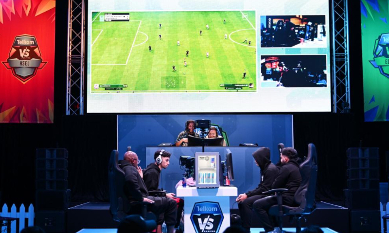 People take part in an e-sports competition at Comic Con Cape Town 2026 in Cape Town, South Africa, May 2, 2026. The 2026 edition of Comic Con Cape Town, a major pop culture and gaming event in Africa, took place here from April 30 to May 3. (Photo by Xabiso Mkhabela/Xinhua)