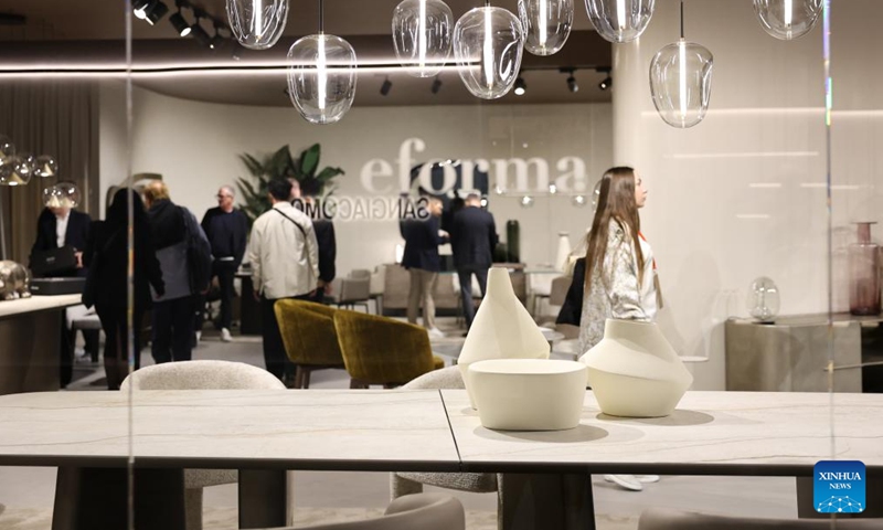 People visit the 64th Salone del Mobile at Fiera Milano Rho exhibition center in Milan, Italy, April 22, 2026. The 64th Salone del Mobile, an international furniture and design industry event, is held here from April 21 to 26. (Xinhua/Li Jing)

