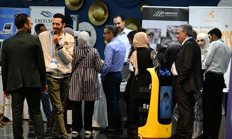 People attend an ophthalmology equipment fair in Damascus, Syria, April 23, 2026. The event brings together participants from Syria and neighboring Arab countries to showcase the latest medical technologies and developments in eye care. (Photo by Ammar Safarjalani/Xinhua)