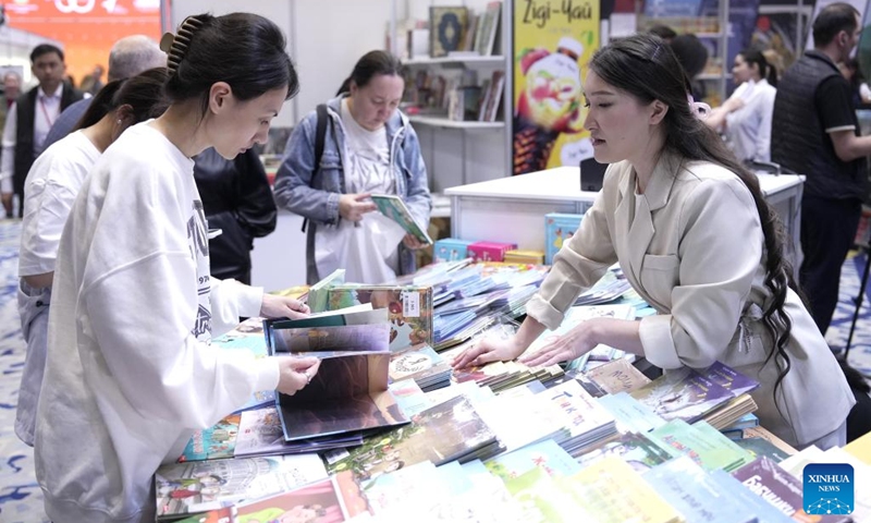 People browse books during the Eurasian Book Fair in Astana, Kazakhstan, April 22, 2026. This event is held here from April 22 to 26. (Photo by Kalizhan Ospanov/Xinhua)