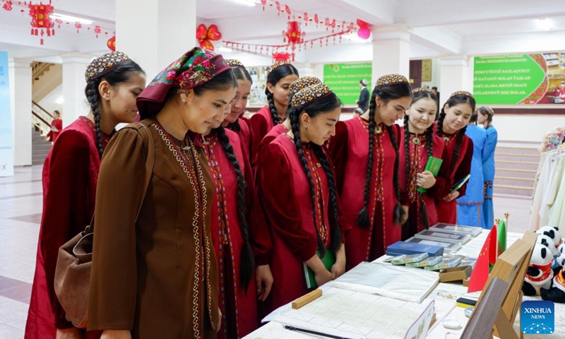 A teacher and students attend the 2026 International Chinese Language Day event in Ashgabat, Turkmenistan, April 23, 2026. A celebration event marking the 2026 International Chinese Language Day was held here Thursday. (Photo by Cui Jiaxin/Xinhua)