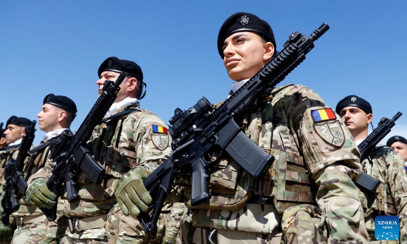 Soldiers attend a ceremony marking Romania's Land Forces Day at the Tomb of Unknown Soldier in Bucharest, Romania, April 23, 2026. Photo: Xinhua