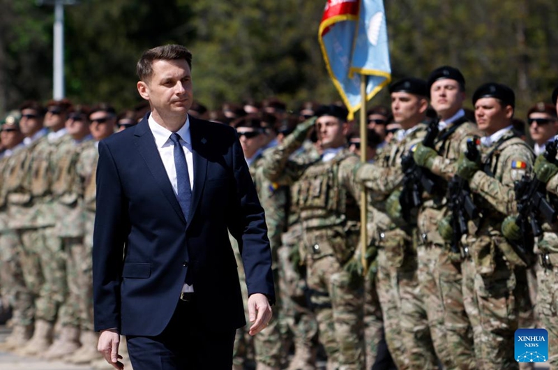 Romania's President of the Senate Mircea Abrudean reviews an honor guard during a ceremony marking Romania's Land Forces Day at the Tomb of Unknown Soldier in Bucharest, Romania, April 23, 2026. Photo: Xinhua