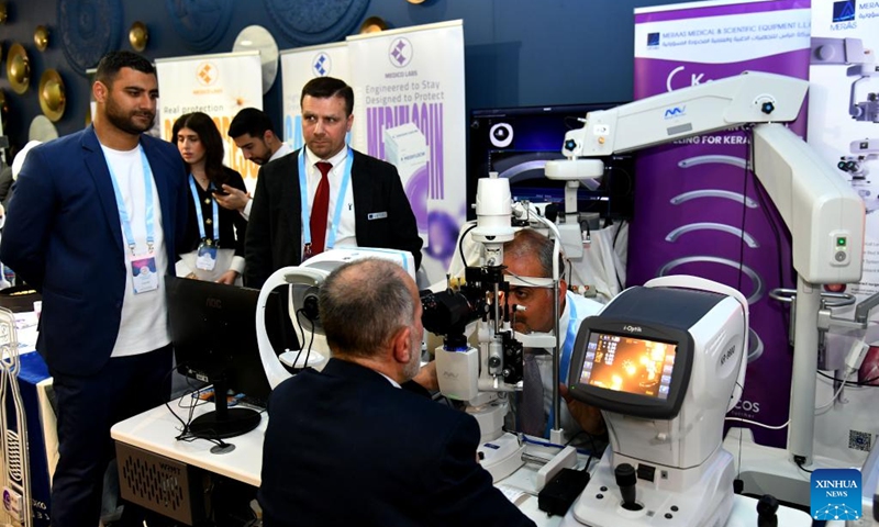 People attend an ophthalmology equipment fair in Damascus, Syria, April 23, 2026. The event brings together participants from Syria and neighboring Arab countries to showcase the latest medical technologies and developments in eye care. (Photo by Ammar Safarjalani/Xinhua)