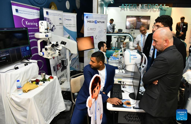 People attend an ophthalmology equipment fair in Damascus, Syria, April 23, 2026. The event brings together participants from Syria and neighboring Arab countries to showcase the latest medical technologies and developments in eye care. (Photo by Ammar Safarjalani/Xinhua)