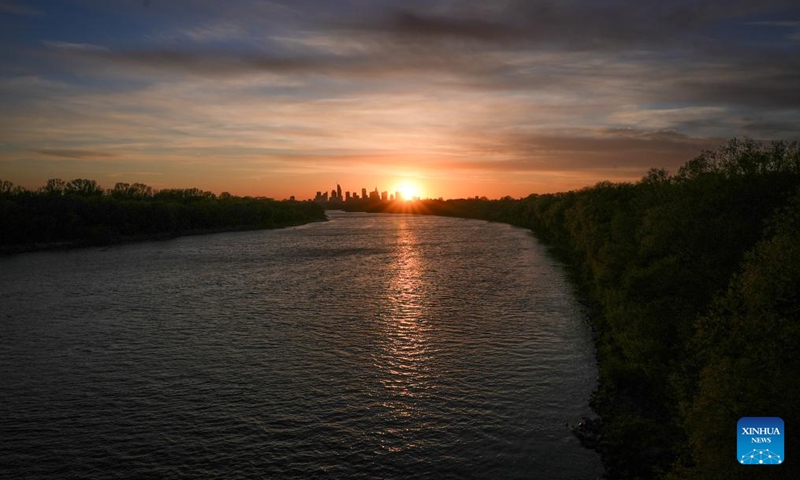 The skyline of Warsaw and the Vistula River are seen at sunset in Warsaw, Poland, April 23, 2026. (Photo by Jaap Arriens/Xinhua)