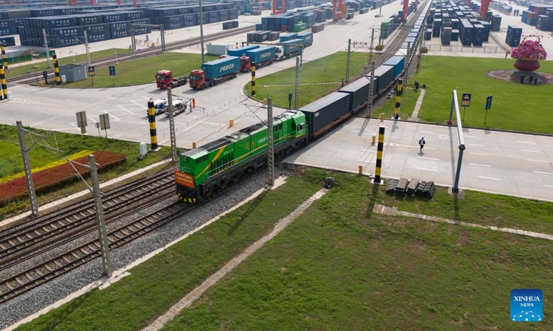 An aerial drone photo taken on April 24, 2026 shows a China-Europe freight train departing from the Xi'an International Port Station in Xi'an, northwest China's Shaanxi Province. The Xi'an International Port Station has handled over 2,000 China-Europe freight train trips this year. The total freight volume transported has exceeded 2.1 million tonnes in this period. Photo: Xinhua