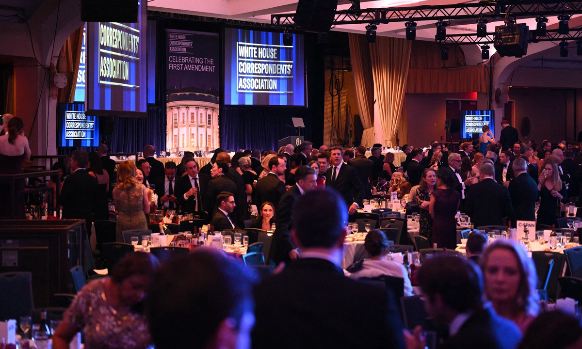Attendees are seen inside the ballroom after shots were reportedly fired during the White House Correspondents' dinner at the Washington Hilton in Washington, DC, on April 25, 2026. Photo: AFP