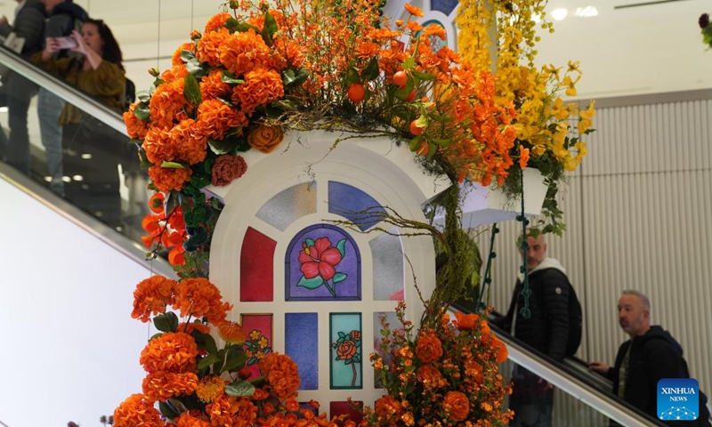 People visit the Macy's Flower Show in New York, the United States, on April 25, 2026. Featuring thousands of flowers and plants with scenic garden installations, the flower show is held here from April 23 to May 10. (Xinhua/Zhang Fengguo)