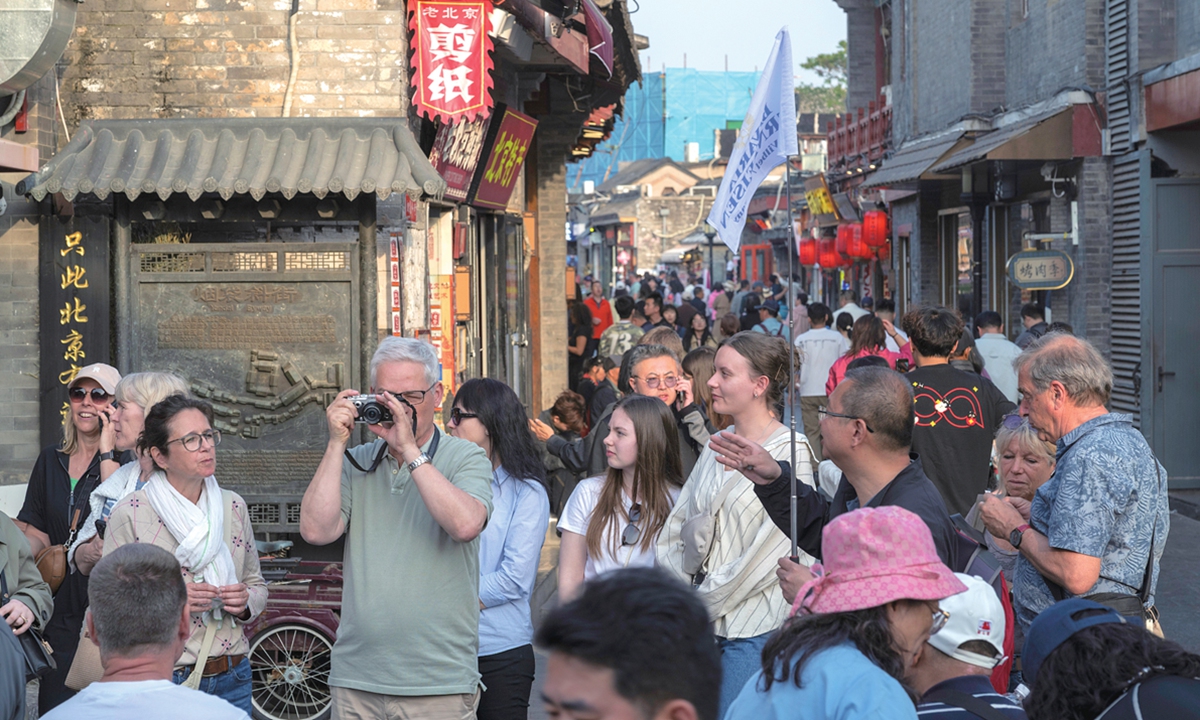 International tourists visit the Shichahai scenic area in Beijing on April 22, 2026. Photo: VCG