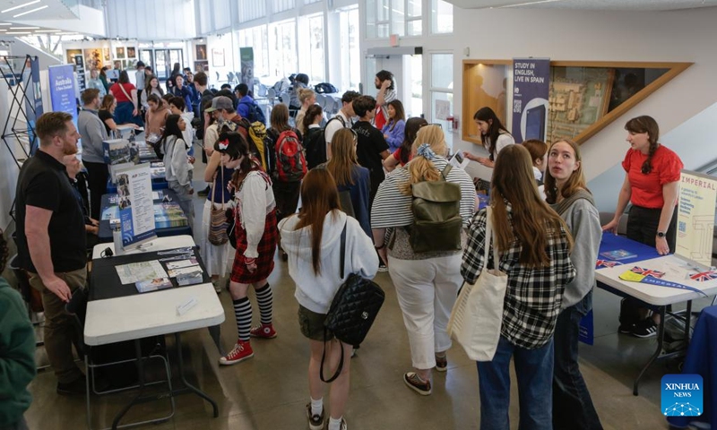 People visit the Global Universities Fair in Vancouver, British Columbia, Canada, April 25, 2026. Representatives from different universities and colleges from multiple countries attended the event, offering students and parents opportunities to explore international higher education options and admission pathways. (Photo by Liang Sen/Xinhua)