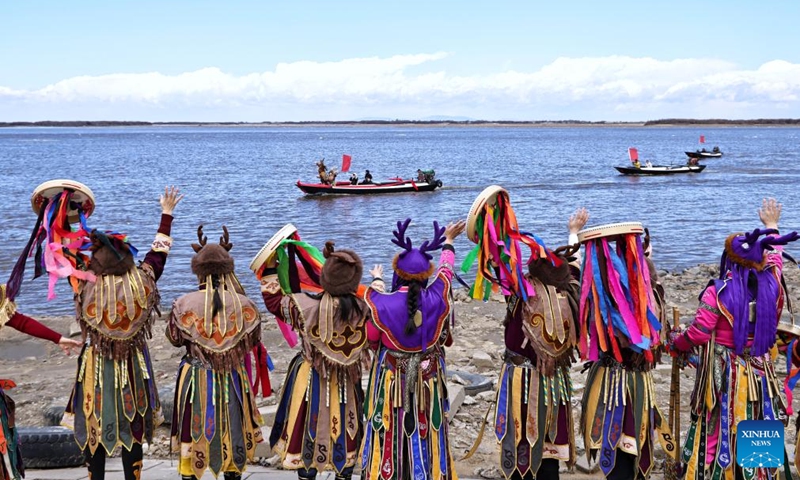 People from the Hezhe ethnic group shout to ceremonially awaken the river at an event during the Kaijiang folk culture week in Tongjiang City, northeast China's Heilongjiang Province, April 25, 2026. Tongjiang kicked off the Kaijiang folk culture week on Saturday, where diverse activities including traditional performances were staged to showcase the region's ethnic heritage.

Kaijiang refers to the annual springtime thawing of ice-covered rivers in northeast China. Photo: Xinhua