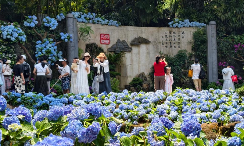 Tourists visit a scenic spot in Nanning, south China's Guangxi Zhuang Autonomous Region, April 25, 2026. (Photo by Yu Xiangquan/Xinhua)