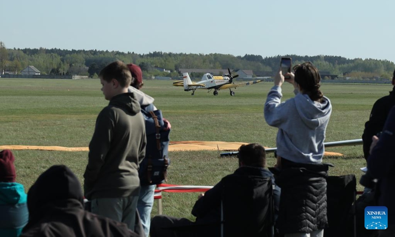 People attend an international air show in Radom, Poland, April 25, 2026. (Xinhua/Cui Li)