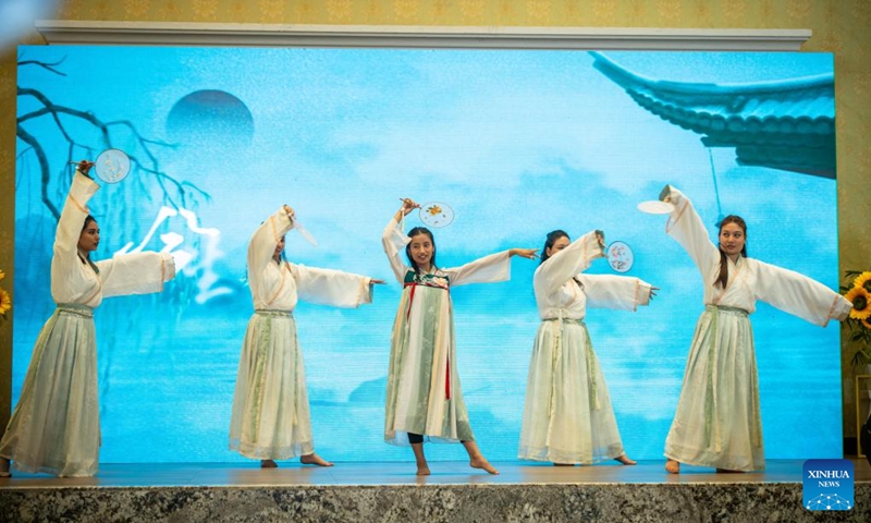 Nepalese students perform traditional Chinese dance at a celebration for the 2026 International Chinese Language Day in Lalitpur, Nepal, on April 26, 2026. The Confucius Institute at Nepal's Tribhuvan University (TU) hosted a celebration on Sunday for the 2026 International Chinese Language Day. (Photo by Hari Maharjan/Xinhua)