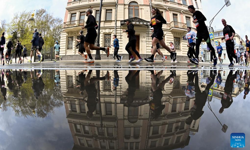 Runners compete during the Moscow Half Marathon in Moscow, Russia, on April 26, 2026. (Photo by Alexander Zemlianichenko Jr/Xinhua)