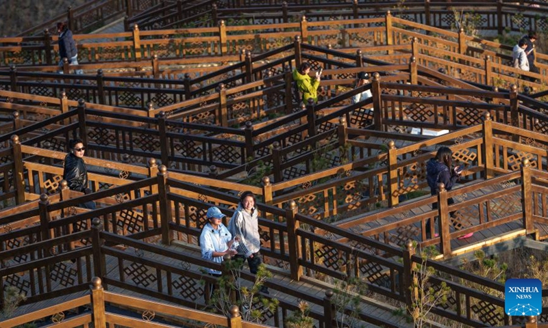 Tourists enjoy their leisure time at the Nanshan park in Lhasa, southwest China's Xizang Autonomous Region, April 26, 2026. (Xinhua/Tenzin Nyida)