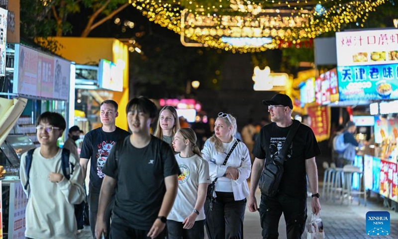 Tourists from Russia visit the Italian Style Area in Tianjin, north China, April 24, 2026. In recent years, Tianjin has become a popular tourist destination, as the city keeps enriching its nighttime experience by expanding tourism scenarios and diversifying business formats. (Xinhua/Sun Fanyue)