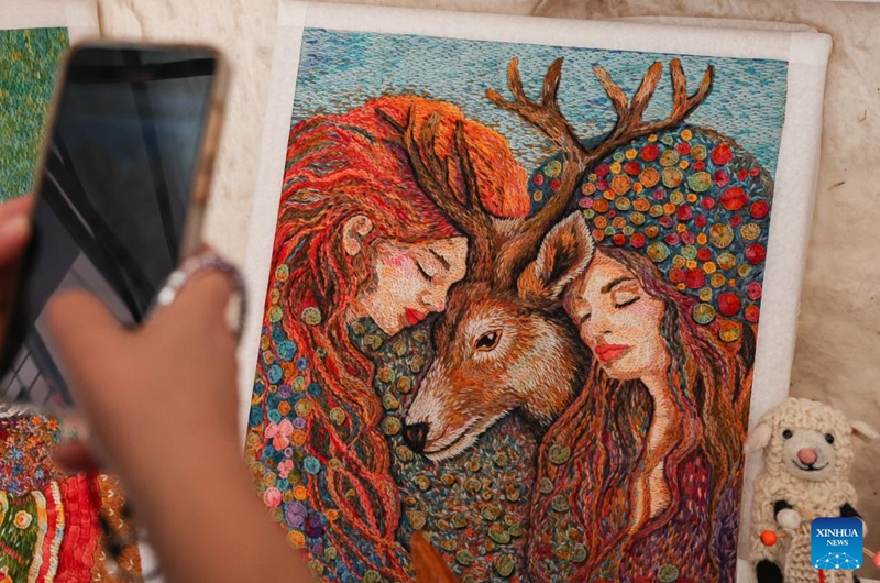 A woolen embroidery artwork is pictured at a wool festival in Santiago, Chile, April 25, 2026. (Xinhua/Zhou Jiayi)
