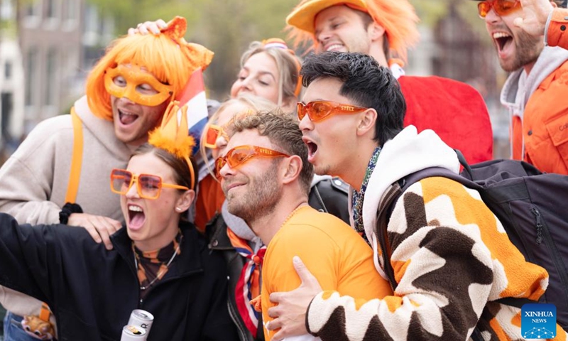 People celebrate the King's Day in Amsterdam, the Netherlands, on April 27, 2026. King's Day is a national holiday in the Kingdom of the Netherlands, celebrated on April 27, King Willem-Alexander's birthday. (Photo by Sylvia Lederer/Xinhua)

