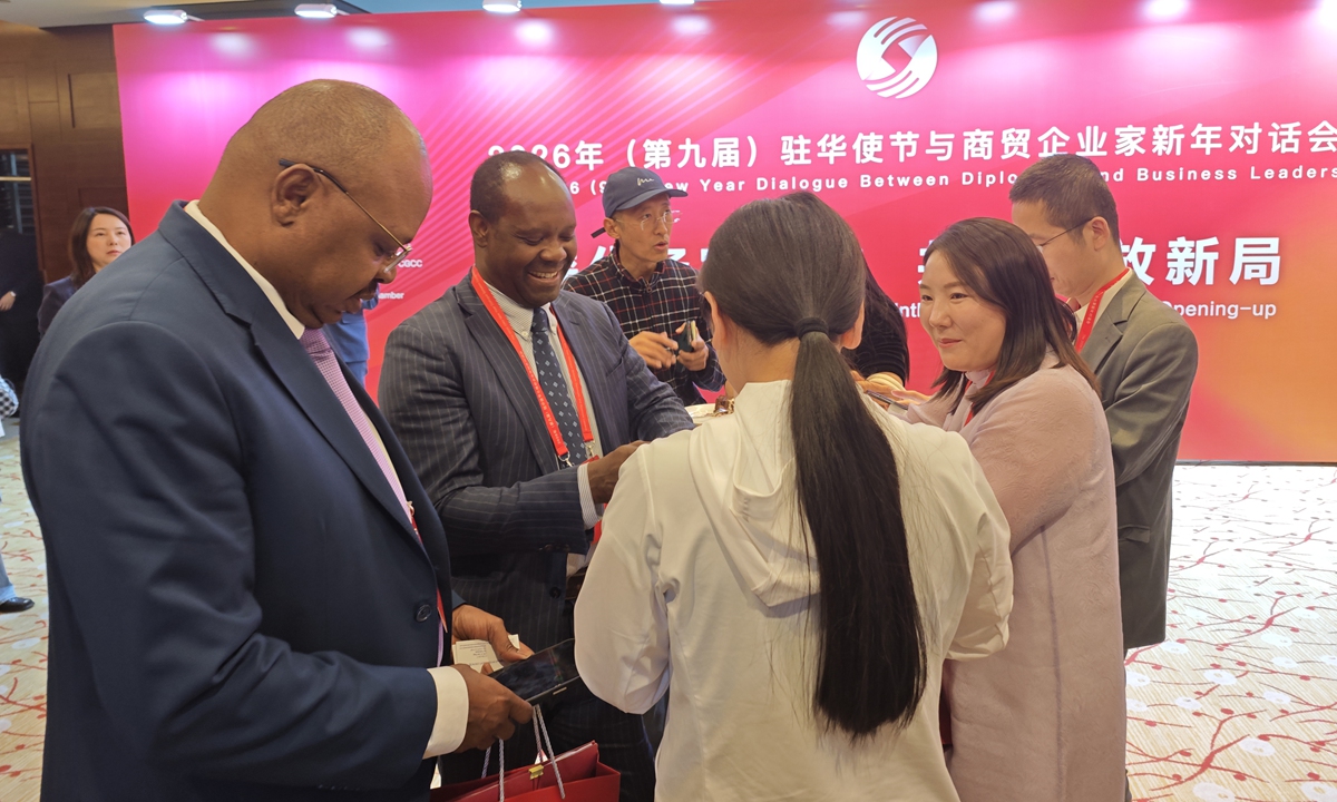 Chinese and foreign participants talk at the forum in Beijing on April 28, 2026. Photo: Yin Yeping/GT