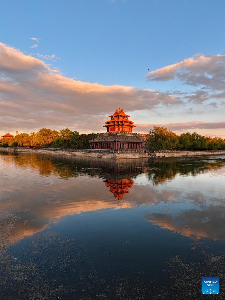 This photo taken with a mobile phone on April 27, 2026 shows the view of a turret of the Palace Museum in the twilight in Beijing, capital of China. (Xinhua/Xu Jinquan)

