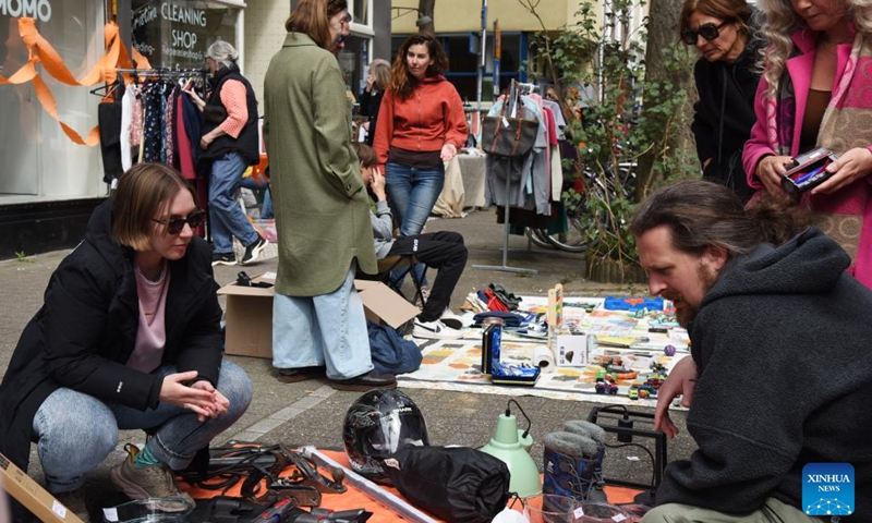 People visit a flea market in The Hague, the Netherlands, on April 27, 2026. Flea markets were held across the Netherlands on King's Day, which is celebrated on April 27, the birthday of Dutch King Willem-Alexander. (Xinhua/Shao Haijun)

