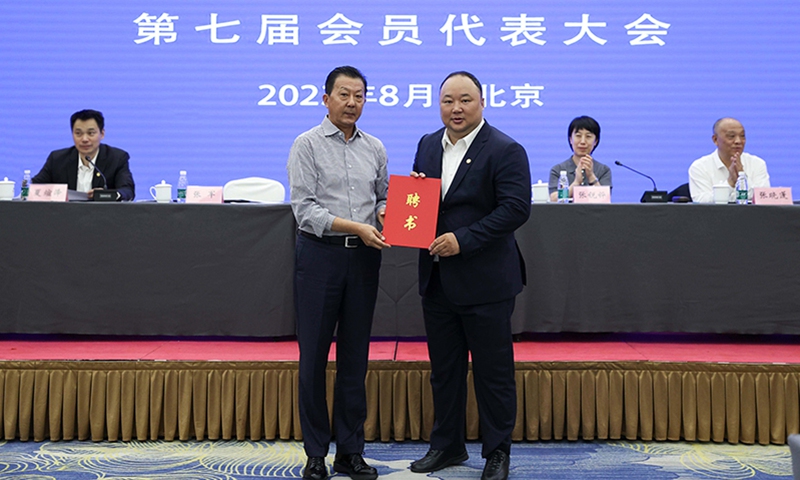 Zhang Jun (right) is re-elected as president of Chinese Badminton Association in 2023. Photo: Chinese Badminton Association