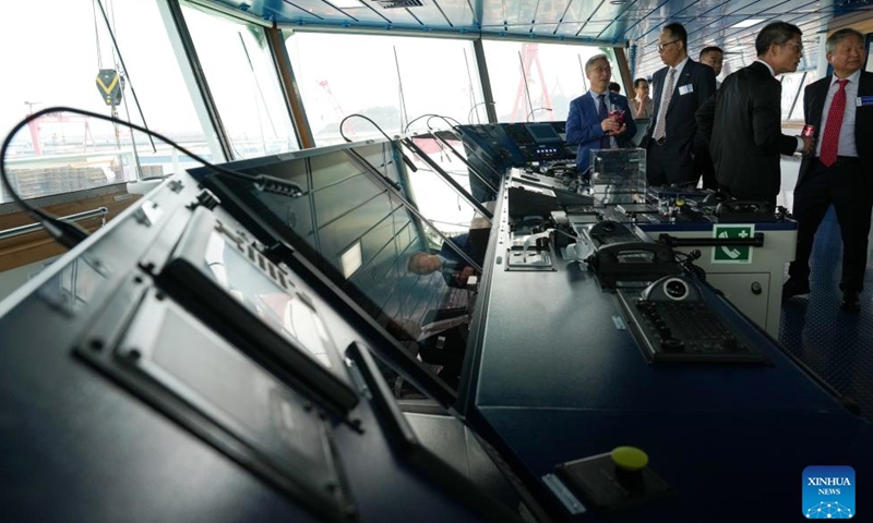 Guests attending the delivery ceremony visit the control room of car carrier Glovis Leader in Guangzhou, south China's Guangdong Province, April 28, 2026. A car carrier with a maximum capacity of 10,800 car equivalent units, described as the world's largest of its kind, was delivered Tuesday in the southern Chinese city of Guangzhou.

