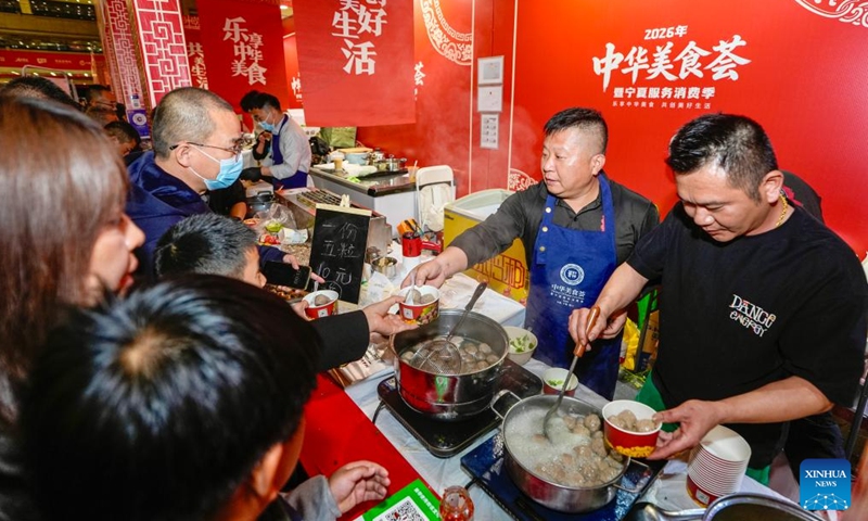Consumers buy beef balls from south China's Guangdong Province during a Chinese cuisine carnival in Yinchuan, northwest China's Ningxia Hui Autonomous Region, on April 28, 2026. (Xinhua/Yang Zhisen)

