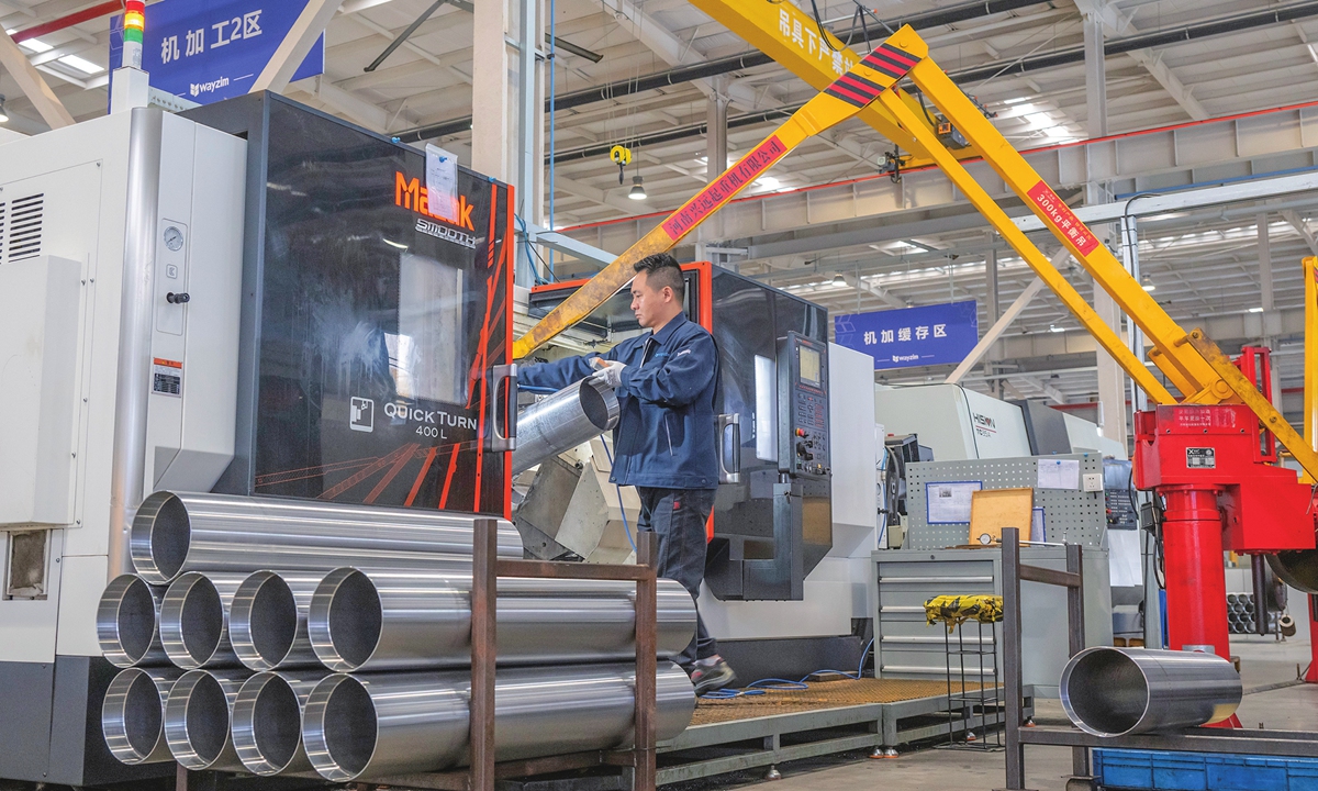 A worker fulfills domestic and overseas orders for logistics equipment at a manufacturing company in Wuhu, East China's Anhui Province, on April 28, 2026. Profits of industrial enterprises above designated size in China hit 1.696 trillion yuan ($248.57 billion) in the first quarter of 2026, up 15.5 percent year-on-year, according to official data. Photo: VCG
