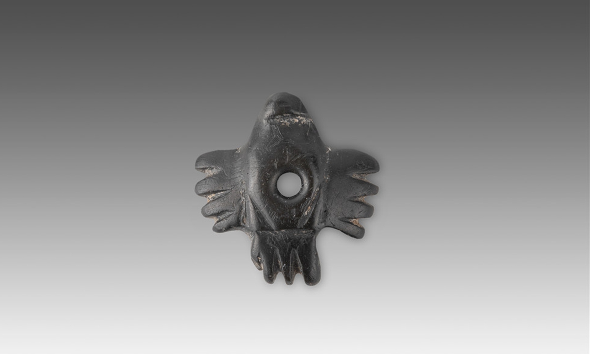 A jade owl from the Zhengjiagou site in Zhangjiakou, North China's Hebei Province. Photo: Courtesy of National Cultural Heritage Administration
