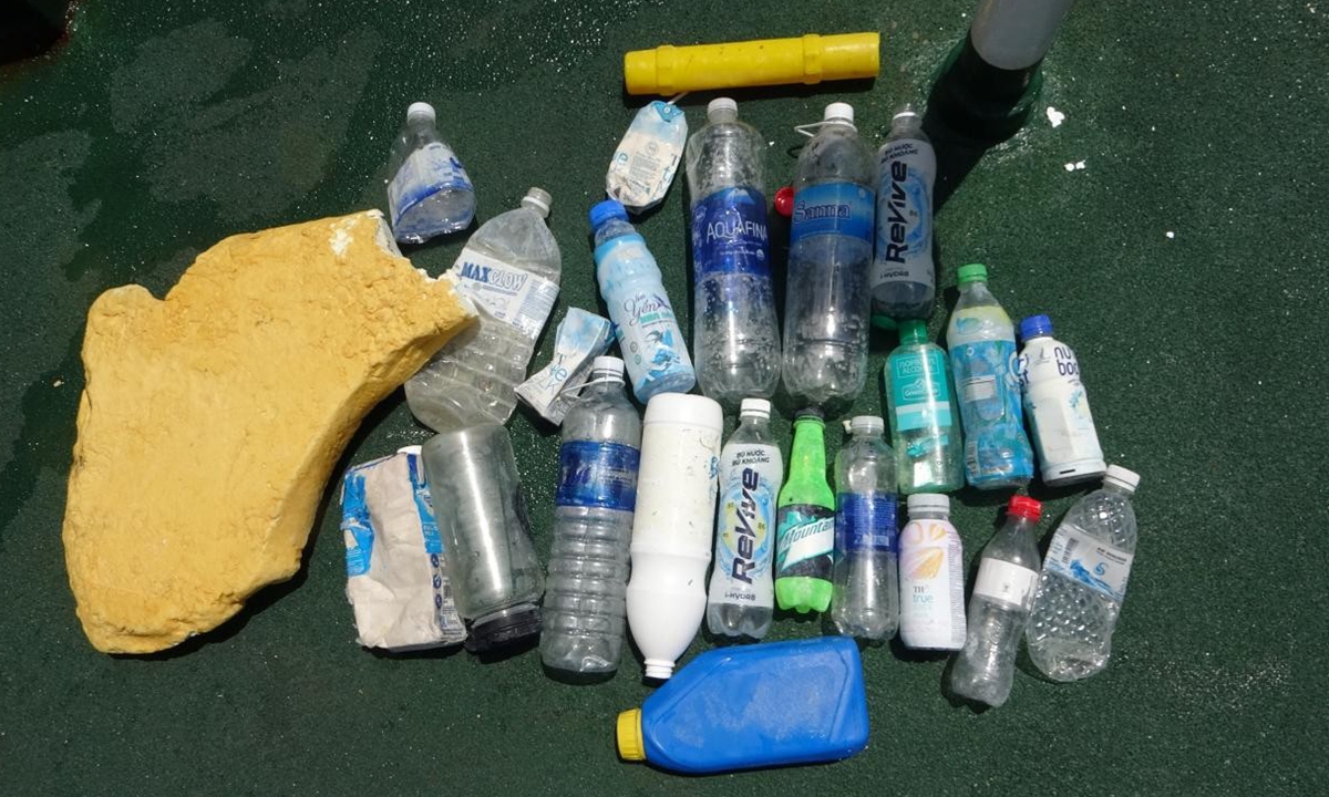 Photo shows the various wastes, including plastic bottles, left by Philippine personnel who illegally set foot on China’s Tiexian Jiao in the South China Sea on On May 3, 2026. Photo: CCG