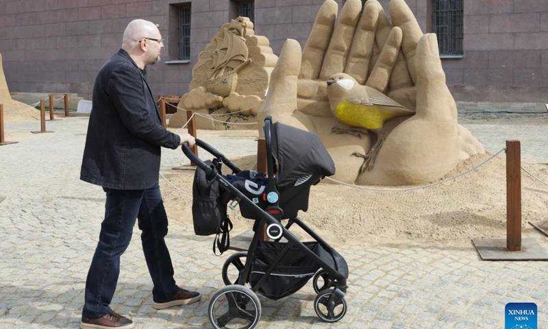 A man views a sand sculpture at the 22nd International Sand Sculpture Festival in St. Petersburg, Russia, May 3, 2026.
The festival kicked off at the Peter and Paul Fortress in St. Petersburg on May 1 and will run for four months. (Photo by Irina Motina/Xinhua)