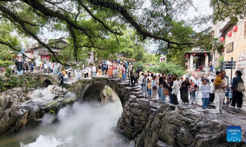 Tourists visit the Huangyao ancient town in Zhaoping County, south China's Guangxi Zhuang Autonomous Region, May 3, 2026.(Photo by Liao Zuping/Xinhua)