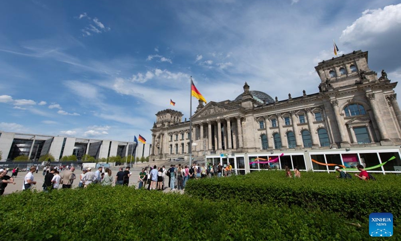 People wait in line to enter the Reichstag building in Berlin, Germany, May 3, 2026. About 11,700 guests visited the Reichstag building during its open day event on Sunday. (Xinhua/Zhang Haofu)