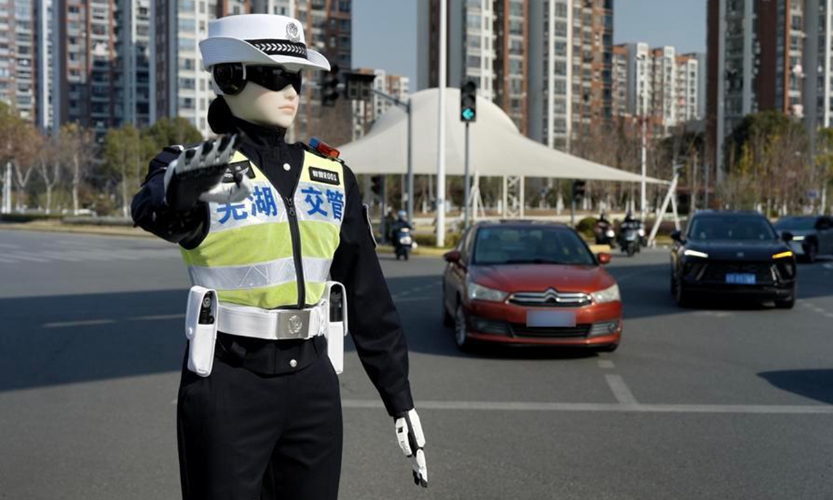 globaltimes.cn - Xinhua - China's robot police patrol cities during Labor Day holiday, signaling AI-powered urban governance