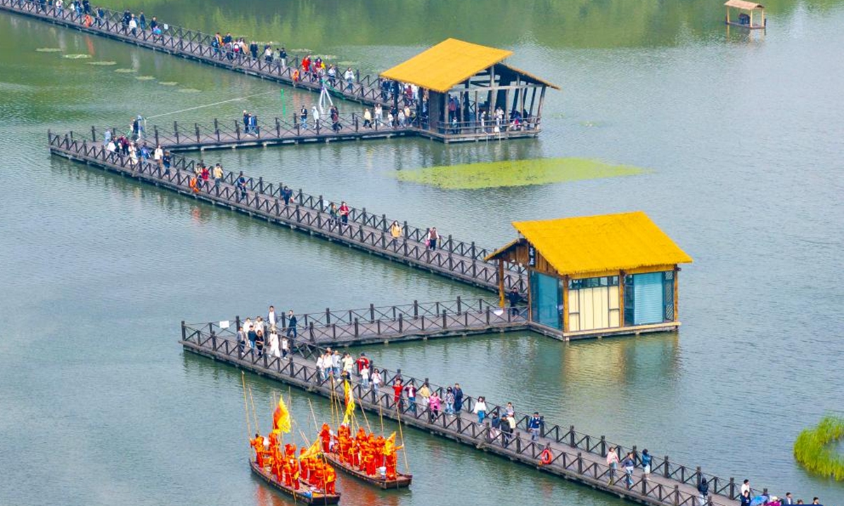 A drone photo taken on May 3, 2026 shows people visiting the Qinhu National Wetland Park in Taizhou City, east China's Jiangsu Province.
People across China stepped out to fully enjoy their leisure time during the ongoing May Day holiday. (Photo by Tang Dehong/Xinhua)
