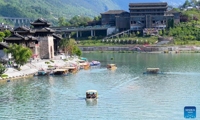 Tourists visit the Zhuoshui ancient town in Qianjiang District, southwest China's Chongqing Municipality, May 4, 2026. People across China stepped out to fully enjoy their leisure time during the ongoing May Day holiday. (Xinhua/Tang Yi)