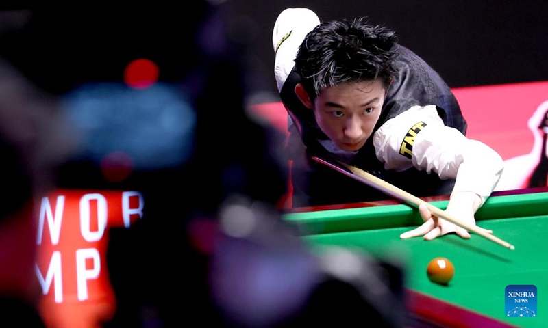 Wu Yize of China prepares to play during the final match between Shaun Murphy of England and Wu Yize of China at the World Snooker Championship 2026 in Sheffield, Britain, May 4, 2026. (Xinhua/Li Ying)