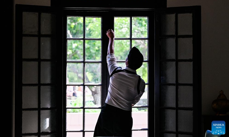 Entrepreneur Yin Tao checks a window of the former residence of Li Jifu in Heping District of north China's Tianjin, May 3, 2026. Photo: Xinhua